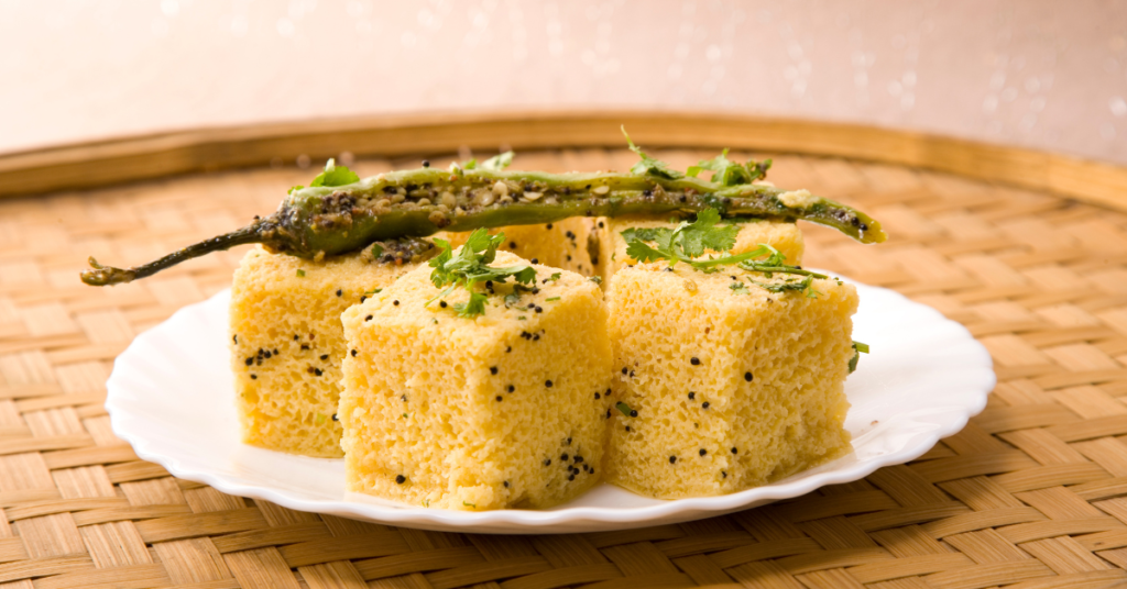 Dhokla a steamed savory cake made from fermented batter